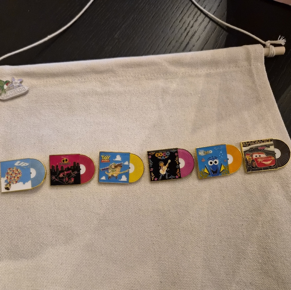Disney Toy Story and Coco Trading Cards with Pink and Yellow Accents